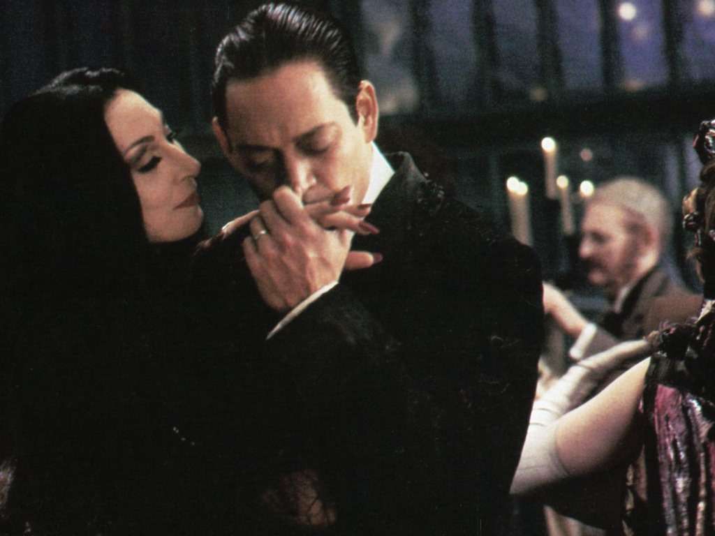 Anjelica Huston and Raul Julia Relationship 